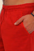 Straight leg cotton pants with elastic waistline and pockets